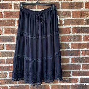 NWT. Black boho skirt w/ elastic waistband. Size S
